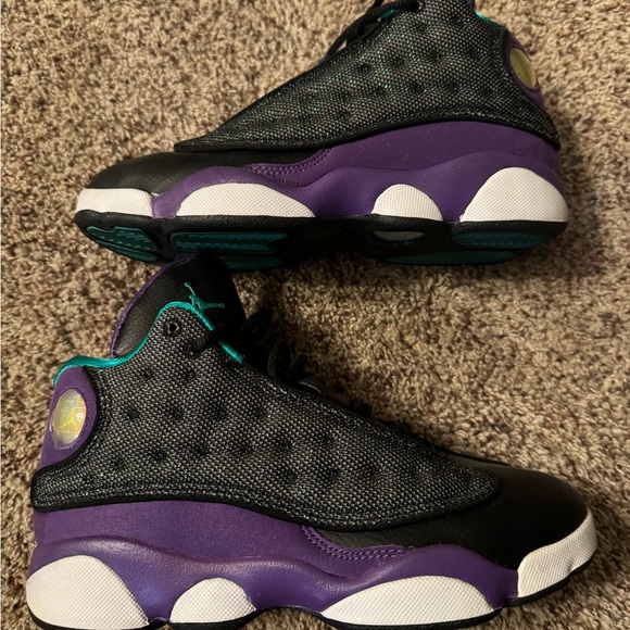 Air Jordan 13 Retros in a black, purple, and teal colorway - Picture 4 of 9